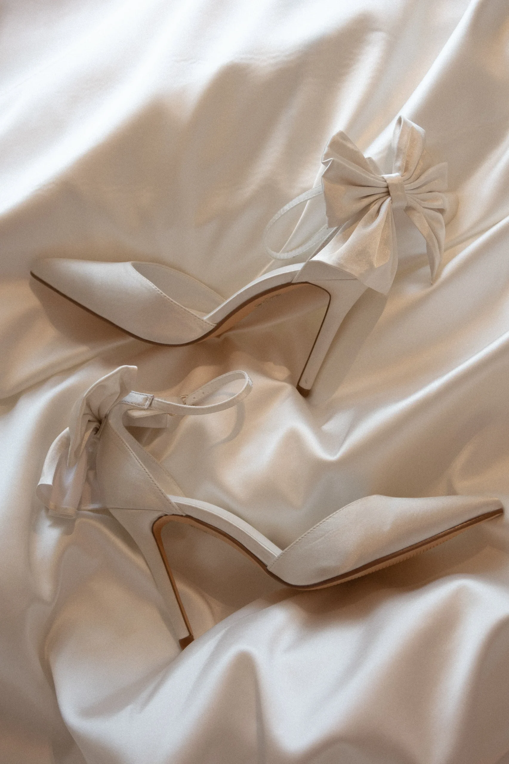 CharmedFINAL SALESatin Bow Heel - White