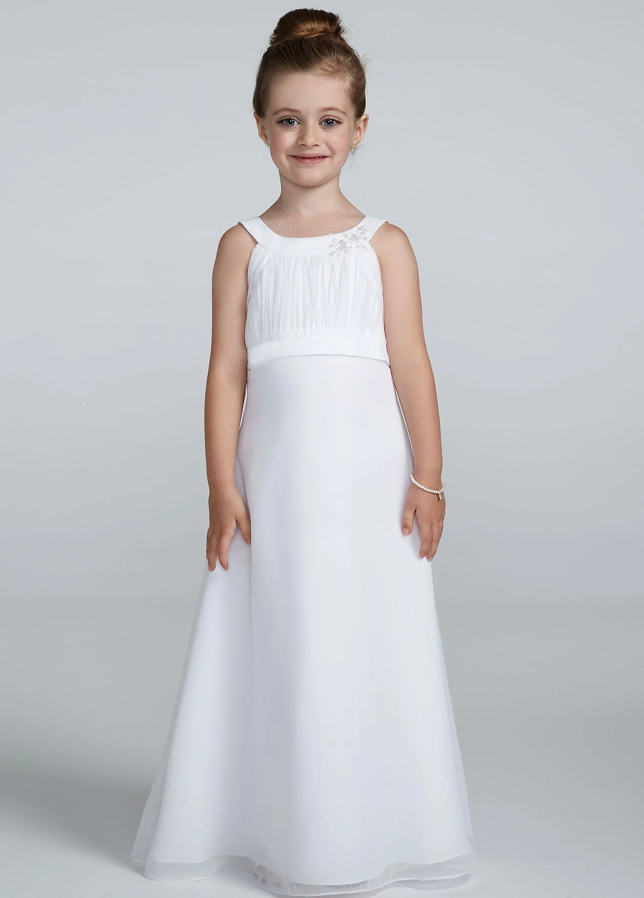 Jewel neckline adorned with floral beaded applique