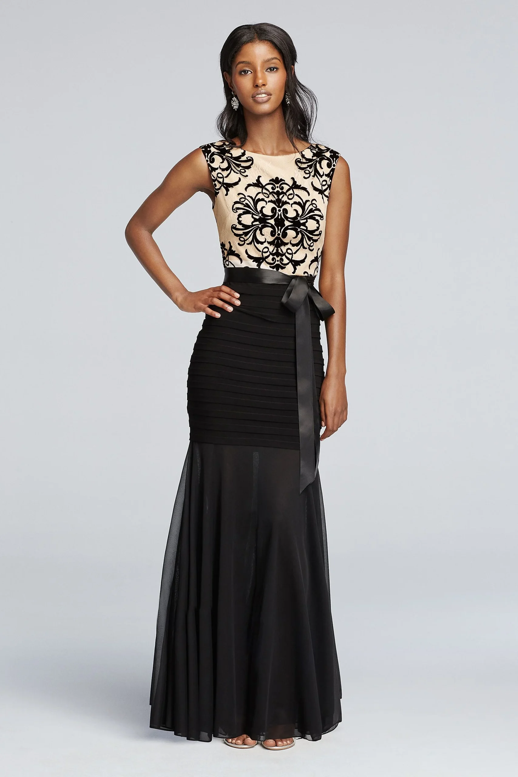 Sleeveless Flocked Lace Bodice with Sheer Trumpet
