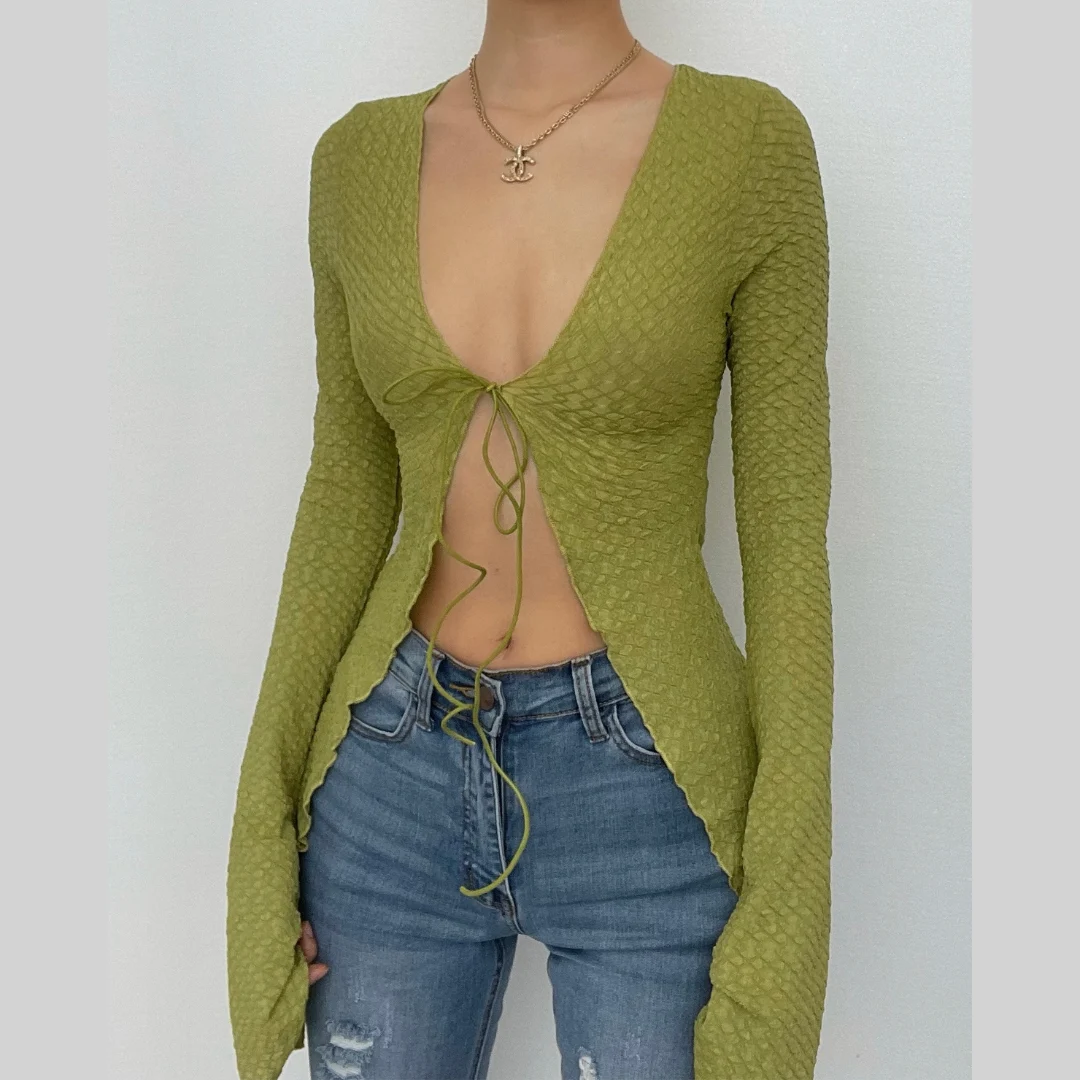 Textured solid slit flared sleeve ruffle self tie crop top